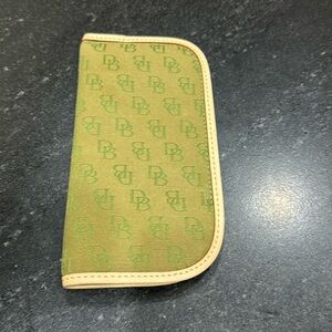 Dooney & Burke green eye glass holder